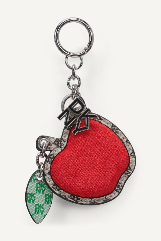 تعليقة بتصميم تفاحة بشعار مغلفة في علبة