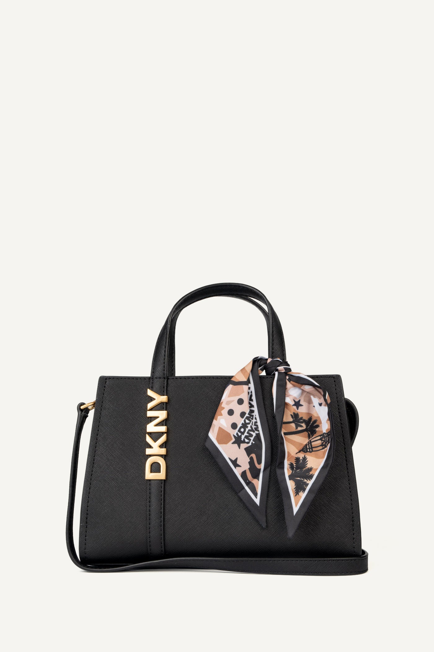 حقيبة كروس ساتشيل آفريل بحجم صغير DKNY × دينا سعدي