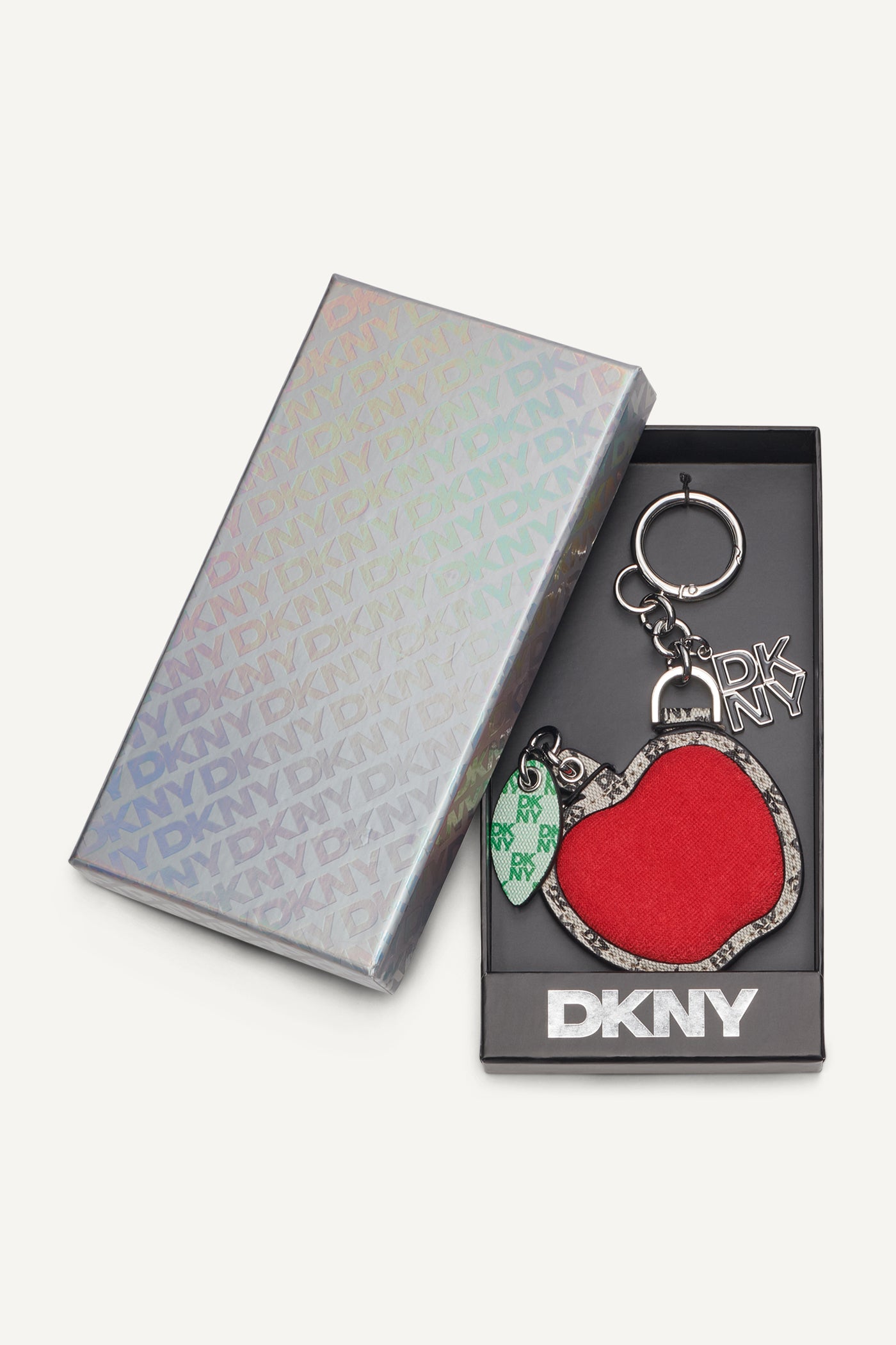 تعليقة بتصميم تفاحة بشعار مغلفة في علبة