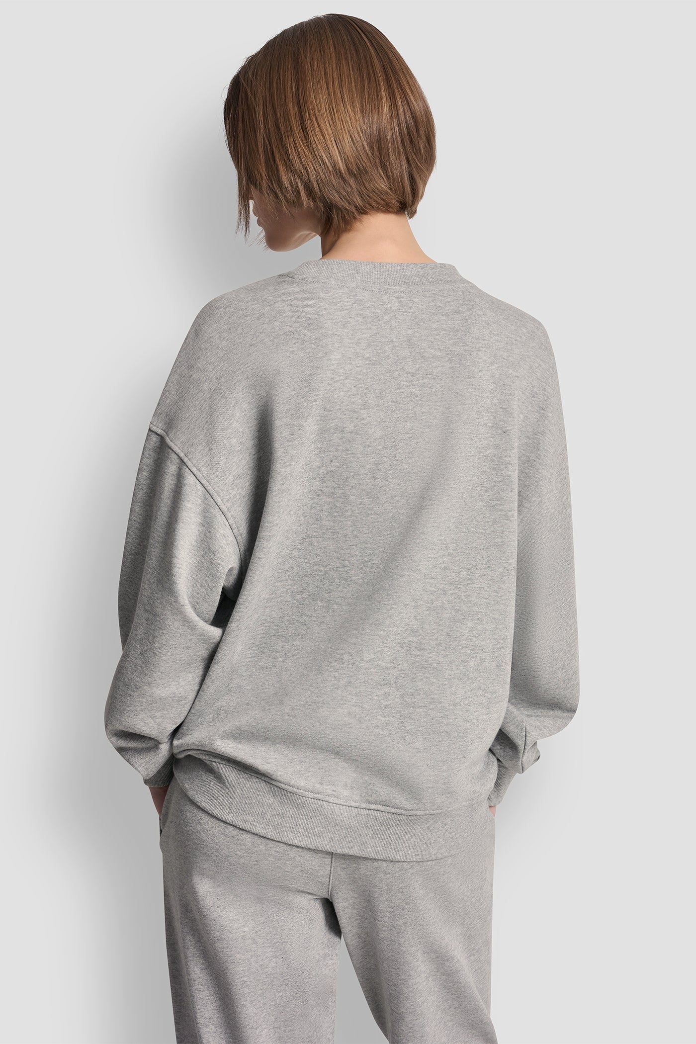 سترة بشعار DKNY كوليجييت ميداليون