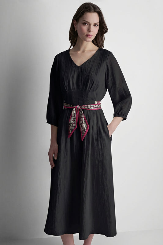 قميص بأكمام طويلة وكسرات أمامية